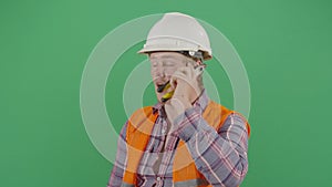 Adult Man Engineer Talking On Pliers Phone