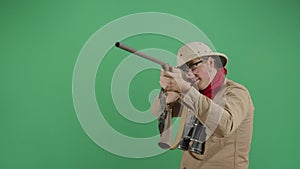 Adult Man Explorer Cleaning And Aiming A Musket