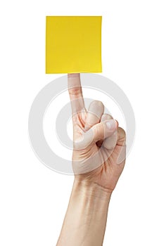Adult man hand holding sticky note