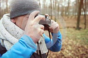 Adult man hiking during the autumn