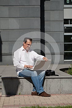 Adult man with laptop