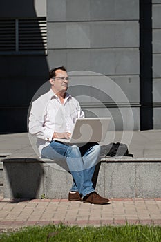 Adult man with laptop