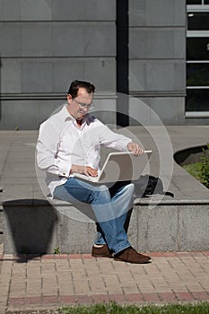 Adult man with laptop