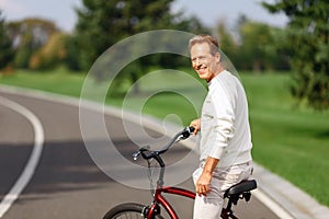 Adult man riding a bicycle