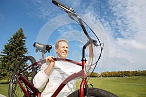 Adult man riding a bicycle