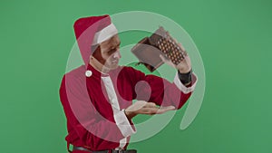 Adult Man Santa Claus Looking For Money In A Chest