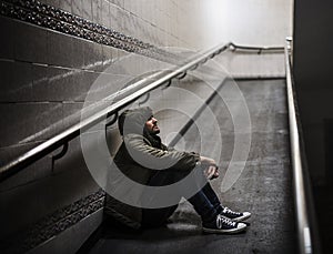 Adult Man Sitting Hopeless on The Floor