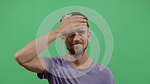 Adult man slapping his forehead