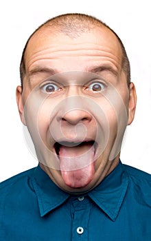 Adult man sticking tongue out