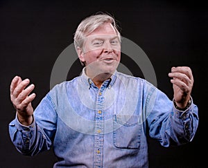 Adult man in studio pleading his case to the listener- a series