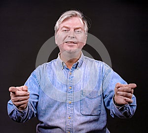 Adult man in studio pleading his case to the listener- a series