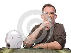 Adult man using inhalter