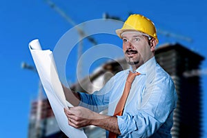 Adult man wears a protective helmet