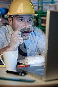 Adult man wears a protective helmet