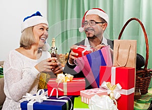 Adult persons preparing for celebrating Christmas