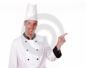 Adult professional chef pointing to his left