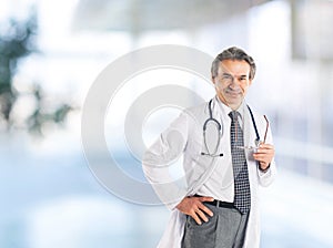 Adult qualified physician diagnostician, with a stethoscope, med