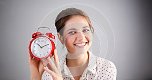 Adult smiling caucasian woman hold red