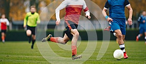 Adult Soccer Players in a Duel. Two College Soccer Teams Playing Soccer League Game. Two Football Players Competing in a Game