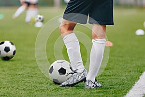 Adult Soccer Training Session. Football Player with Ball on the Field