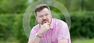 Adult solid man prone to overweight with a beard