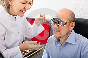 Adult specialist examinating eyesight