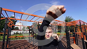 Adult Sports Guy Is Boxing - Doing Street Workout Exercises