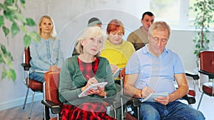 Adult students listening in the classroom university