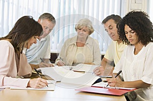 Adult students studying together