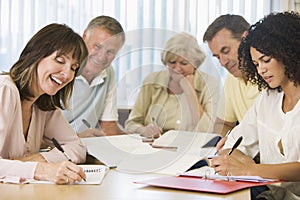 Adult students studying together