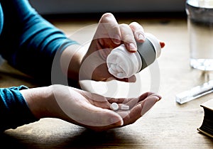 Adult Taking Medication Supplements Vitamins photo