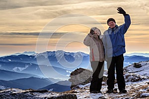 Adult tourists in the winter mountains, Carpathians