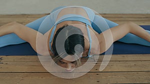 Adult Woman Doing Yoga At Home