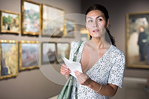 Adult woman in gallery