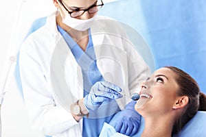 Adult woman having a visit at the dentist`s