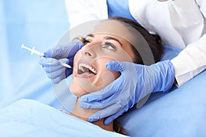 Adult woman having a visit at the dentist`s