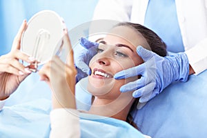 Adult woman having a visit at the dentist`s