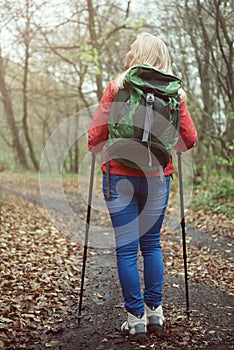 Adult woman hiking during the autumn