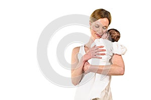 Adult woman holding baby in her arms