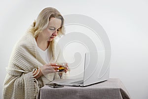 adult woman looking at computer monitor looking medicines prescriptions consultation with doctor cold flu disease