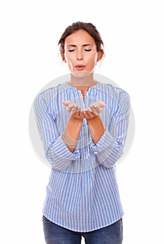 Adult woman requesting a wish with closed eyes photo