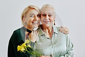 Adult Woman with Senior Mother Minimal