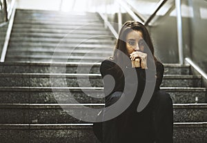 Adult Woman Sitting Look Worried on The Stairway