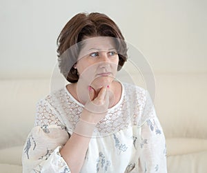 An Adult woman with a sore throat