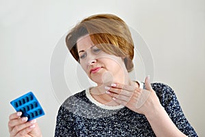 Adult woman with a sore throat