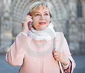 adult woman talking on mobile phone