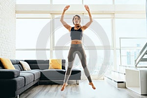 Adult Woman Training Legs Doing Squat and Jumping