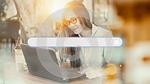 Adult woman using laptop in the cafe for searching browsing internet data information. Business concept for Using search with your