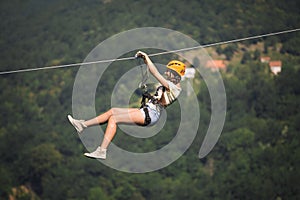 Adult woman on zip line