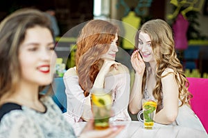 Adult women gossip behind their rivals. The concept of lifestyle, gossip, lies, friendship